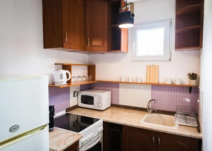 Апартаменты Cozy House With Free Parking *